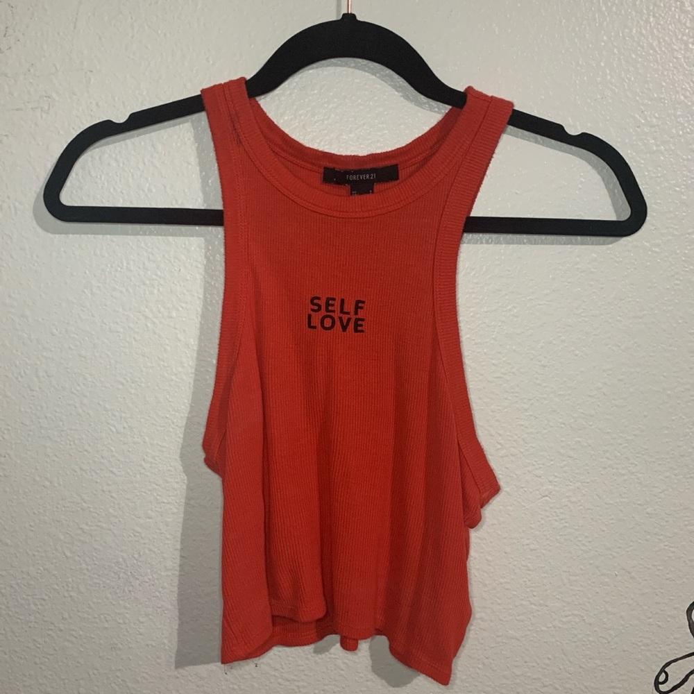 An orange tank top shirt